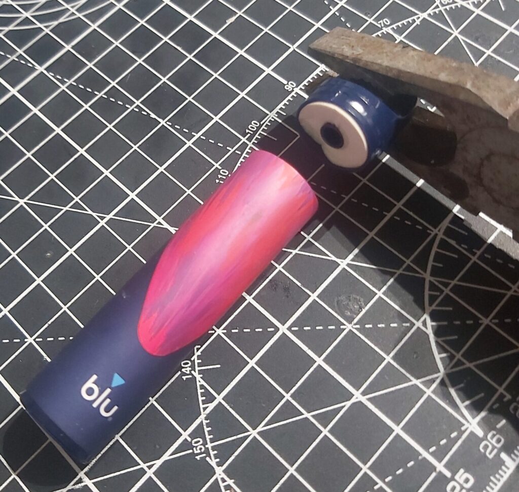 The Blu Disposable Vape Pull the top off with a pair of pliers