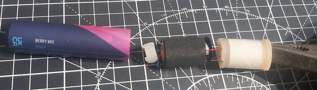 The Blu Disposable Vape pull the insides out of the metal tube with a pair of pliers