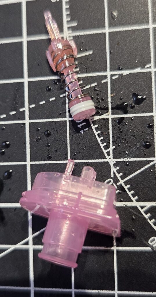 Lost Mary BM6000 Disposable Vape - Pull the spring part out of the top of the liquid cartridge